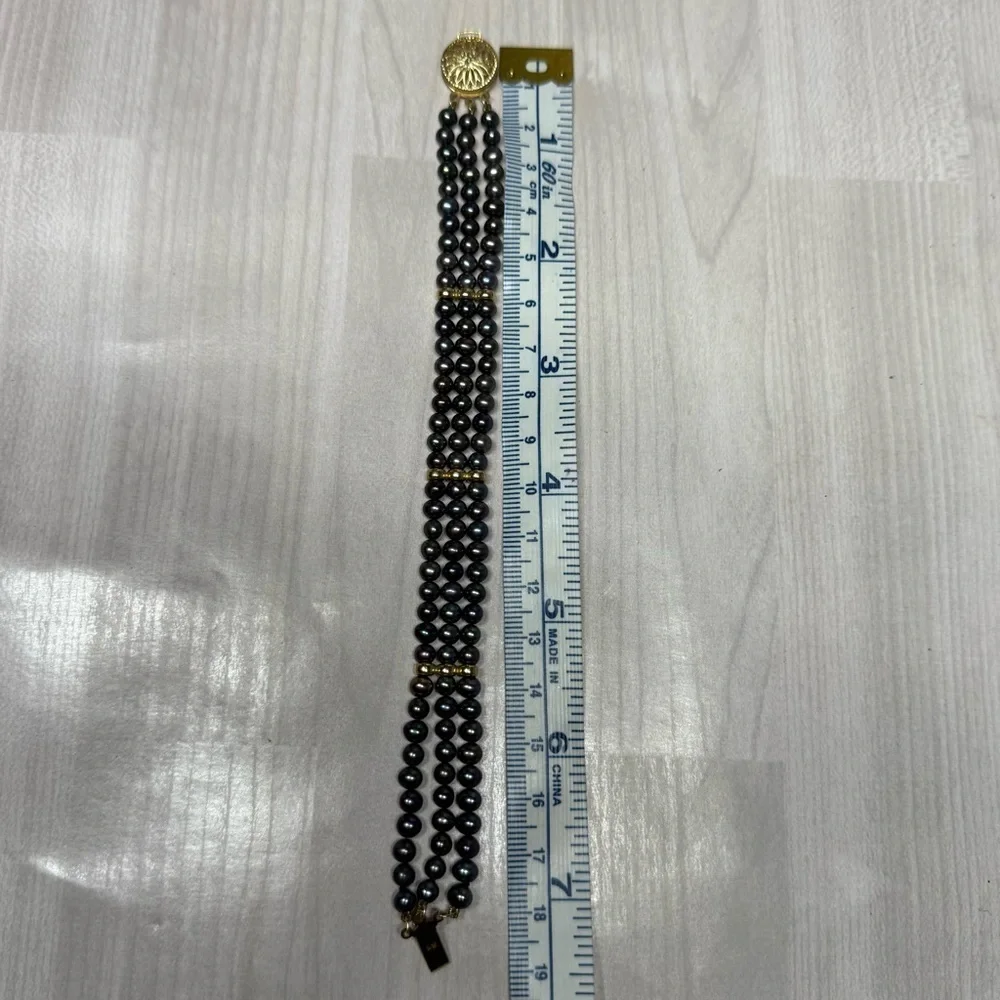 14k Yellow Gold Elegant Black Natural Multi-Strand Pearl Bracelet.
